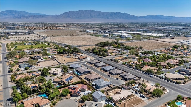 5851 Slate Rock Ct, Las Vegas, NV 89149 - aerial view of residential area featuring a mountain backdrop