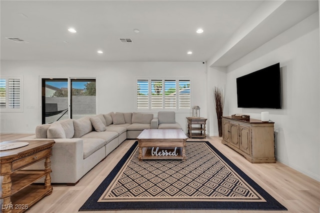 5851 Slate Rock Ct, Las Vegas, NV 89149 - living area featuring light wood-style flooring and recessed lighting