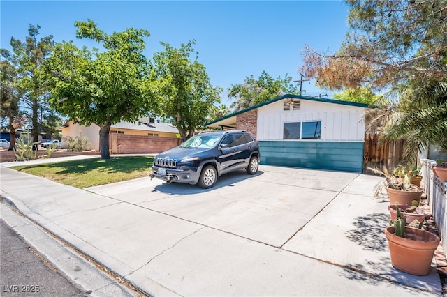 1904 Fontenelle St, Las Vegas, NV 89102 - view of front of property with driveway and brick siding