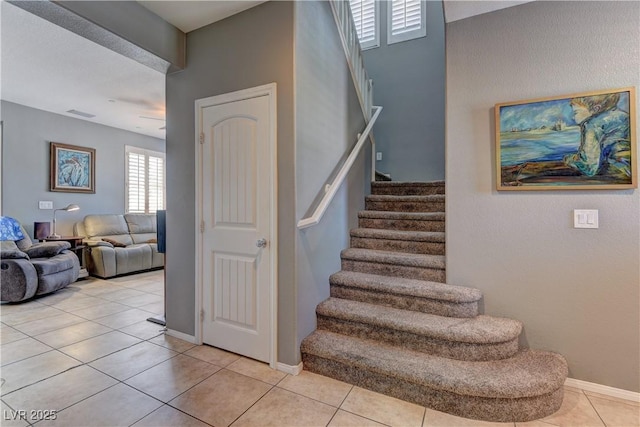 1904 Via Firenze, Henderson, NV 89044 - staircase featuring baseboards and tile patterned flooring