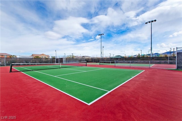 1904 Via Firenze, Henderson, NV 89044 - view of tennis court featuring community basketball court