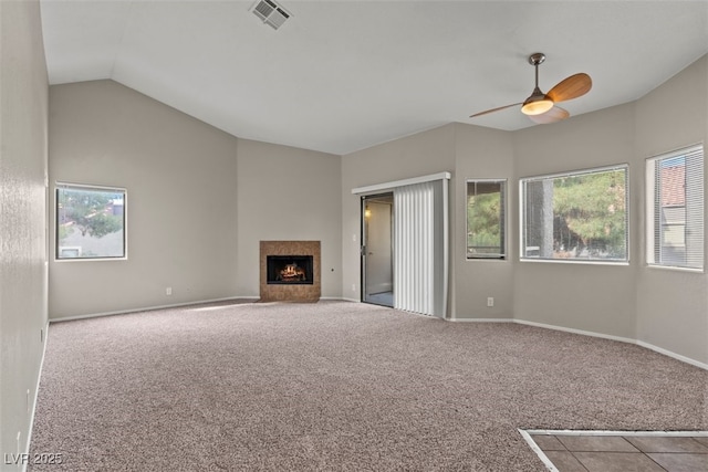 5042 S Rainbow Blvd Unit 206, Las Vegas, NV 89118 - unfurnished living room with ceiling fan, carpet flooring, vaulted ceiling, and healthy amount of natural light