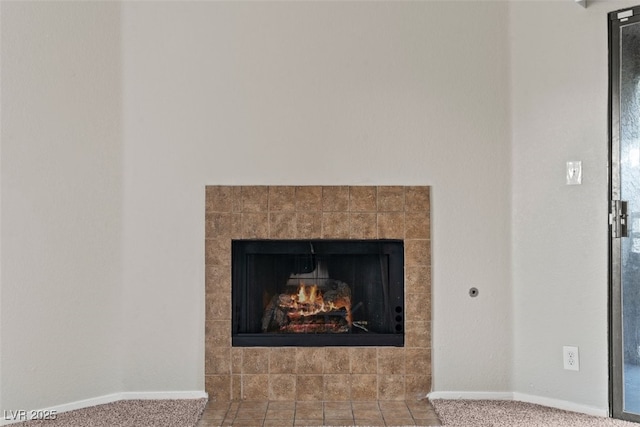 5042 S Rainbow Blvd Unit 206, Las Vegas, NV 89118 - detailed view of a tile fireplace and carpet floors
