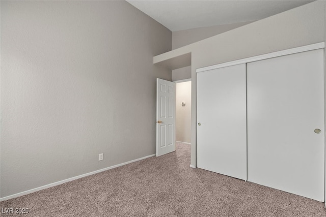 5042 S Rainbow Blvd Unit 206, Las Vegas, NV 89118 - unfurnished bedroom with carpet floors, a closet, and lofted ceiling