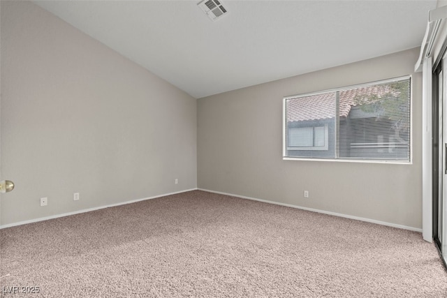 5042 S Rainbow Blvd Unit 206, Las Vegas, NV 89118 - spare room with carpet and lofted ceiling