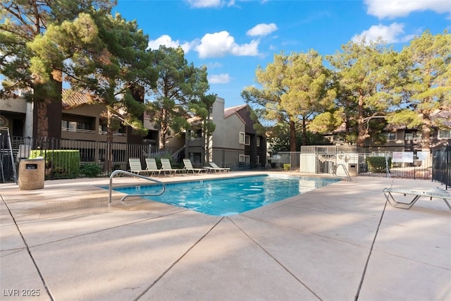 5042 S Rainbow Blvd Unit 206, Las Vegas, NV 89118 - community pool featuring a patio area