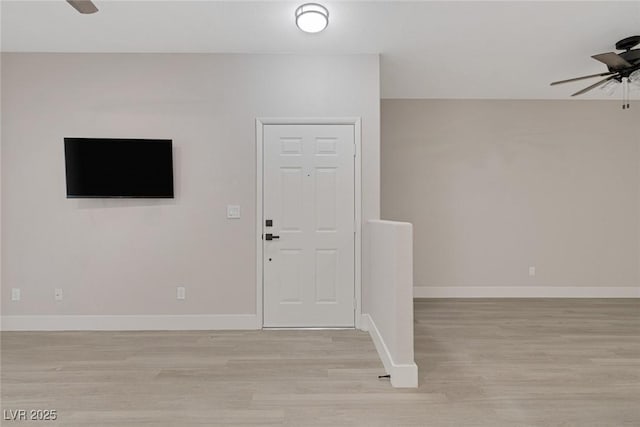 5751 E Hacienda Ave Unit 159, Las Vegas, NV 89122 - foyer entrance with a ceiling fan and light wood-style flooring