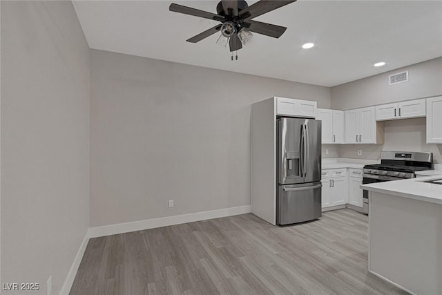 5751 E Hacienda Ave Unit 159, Las Vegas, NV 89122 - kitchen with appliances with stainless steel finishes, light countertops, ceiling fan, light wood finished floors, and recessed lighting