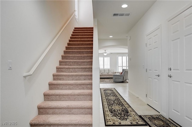 3949 Amanda Bay Ave, North Las Vegas, NV 89081 - stairs with arched walkways, tile patterned floors, recessed lighting, and ceiling fan
