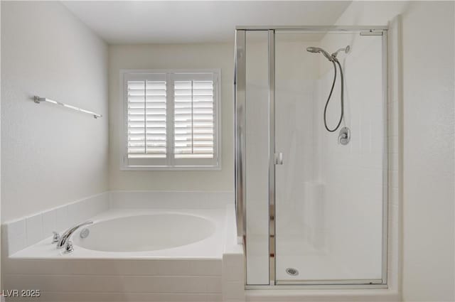 3949 Amanda Bay Ave, North Las Vegas, NV 89081 - bathroom featuring a stall shower and a garden tub