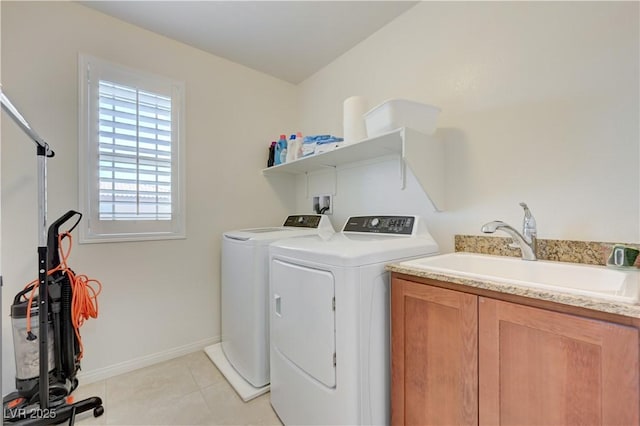 3949 Amanda Bay Ave, North Las Vegas, NV 89081 - washroom featuring independent washer and dryer, cabinet space, and light tile patterned flooring