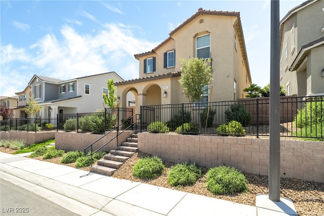 3641 Portici Ln, Henderson, NV 89044 - mediterranean / spanish house with stucco siding, a residential view, and a tiled roof