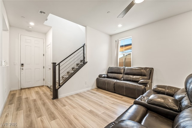 3641 Portici Ln, Henderson, NV 89044 - living room with light wood-type flooring, stairway, recessed lighting, and a ceiling fan