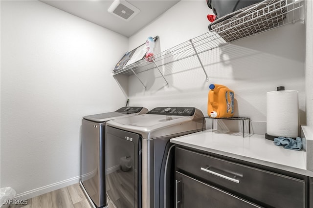 3641 Portici Ln, Henderson, NV 89044 - laundry room with independent washer and dryer and light wood-type flooring