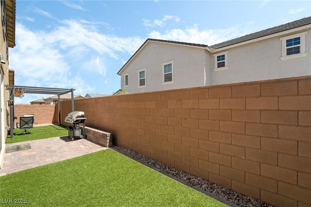 3641 Portici Ln, Henderson, NV 89044 - fenced backyard featuring a patio area