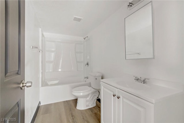 2963 Juniper Hills Blvd Unit 104, Las Vegas, NV 89142 - bathroom featuring vanity, wood finished floors, and washtub / shower combination