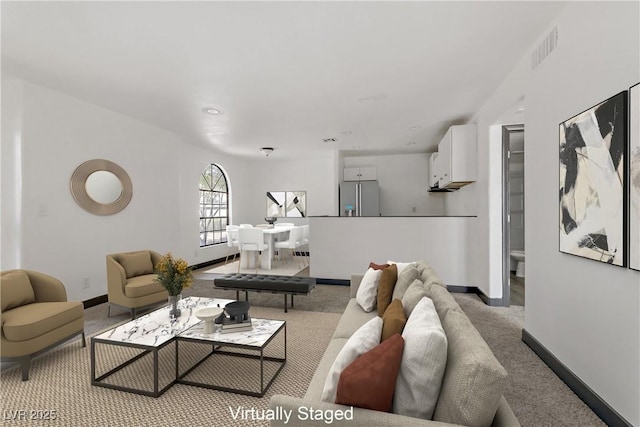 2963 Juniper Hills Blvd Unit 104, Las Vegas, NV 89142 - living room with light carpet