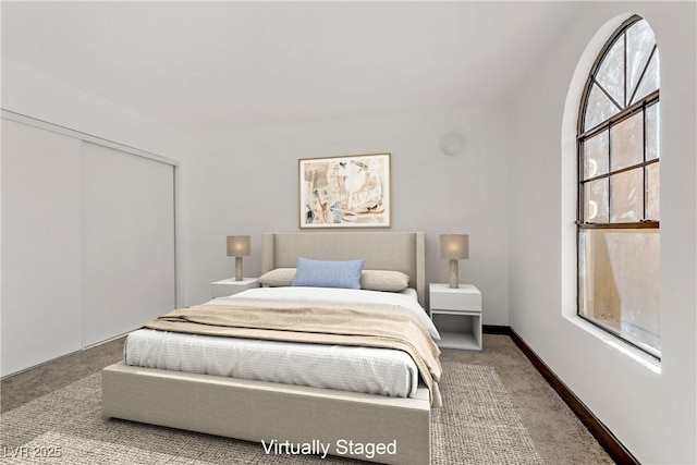 2963 Juniper Hills Blvd Unit 104, Las Vegas, NV 89142 - bedroom featuring carpet flooring and a closet