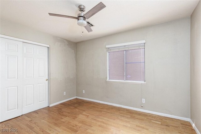 426 Lost Trail Dr, Henderson, NV 89014 - unfurnished bedroom with light wood-style floors, a closet, and ceiling fan