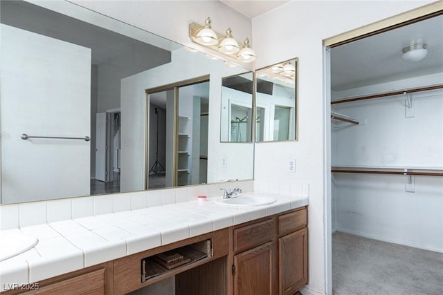 426 Lost Trail Dr, Henderson, NV 89014 - bathroom with vanity and a spacious closet