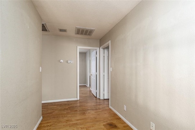 426 Lost Trail Dr, Henderson, NV 89014 - hallway with wood finished floors and baseboards