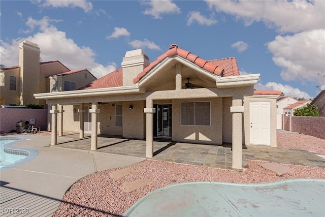 426 Lost Trail Dr, Henderson, NV 89014 - rear view of property with a patio, stucco siding, and a chimney