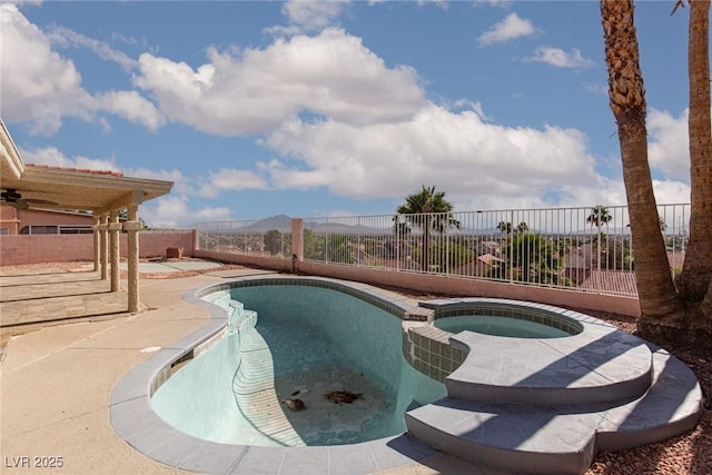 426 Lost Trail Dr, Henderson, NV 89014 - view of swimming pool featuring a fenced backyard, a pool with connected hot tub, and a patio