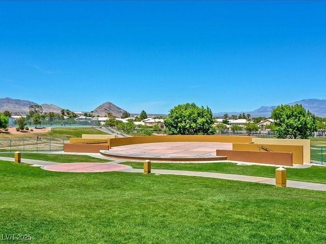 9517 Mountainair Ave, Las Vegas, NV 89134 - view of property's community featuring a mountain view and a yard