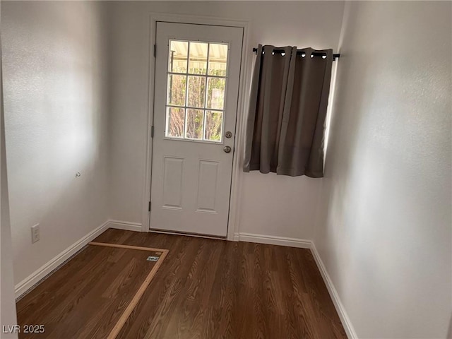 49 Fourth, Mcgill, NV 89318 - doorway to outside with baseboards and dark wood finished floors