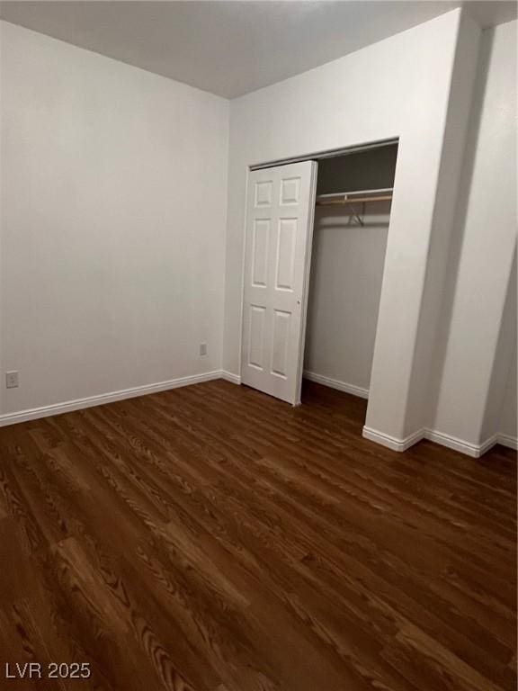49 Fourth, Mcgill, NV 89318 - unfurnished bedroom with dark wood finished floors and a closet