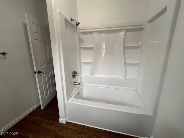 49 Fourth, Mcgill, NV 89318 - bathroom featuring wood finished floors and shower / tub combination
