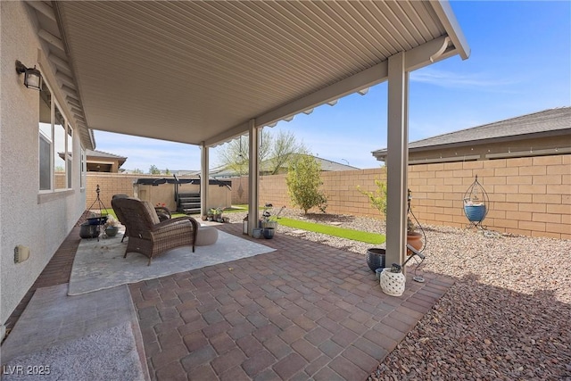 605 Cadence Vista Dr, Henderson, NV 89011 - fenced backyard with a patio