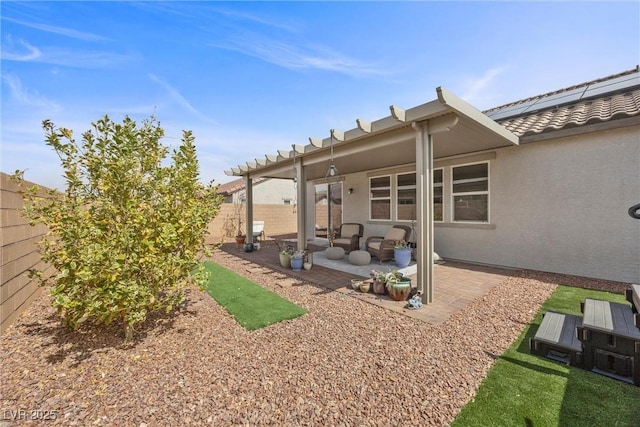 605 Cadence Vista Dr, Henderson, NV 89011 - back of property with a patio area, a fenced backyard, and stucco siding