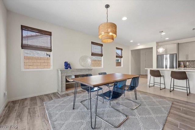 605 Cadence Vista Dr, Henderson, NV 89011 - dining room featuring light wood-style flooring and recessed lighting