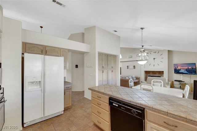 2216 Sapphire Valley St, Las Vegas, NV 89128 - kitchen featuring white fridge with ice dispenser, dishwasher, light brown cabinetry, ceiling fan, and vaulted ceiling