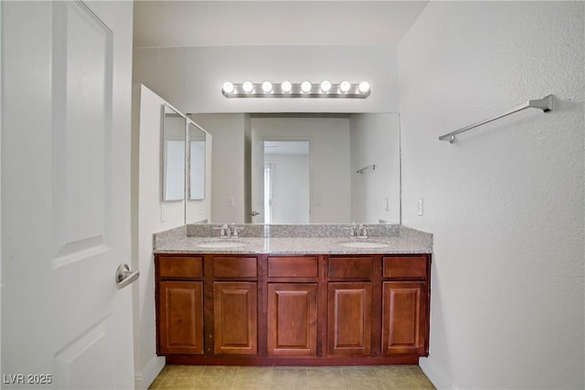 2801 N Rainbow Blvd Unit 273, Las Vegas, NV 89108 - bathroom with double vanity and baseboards