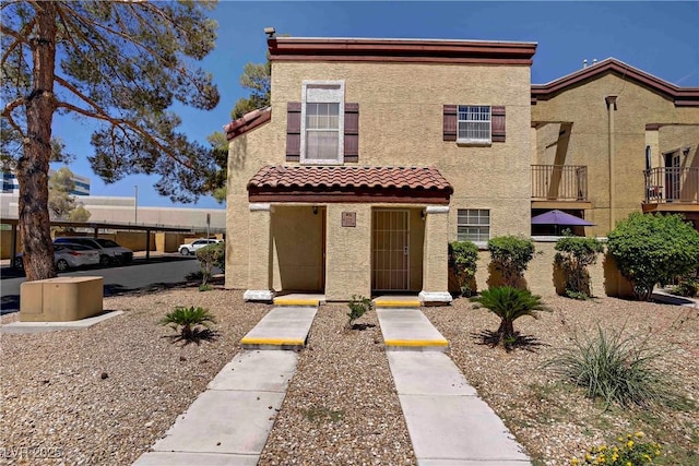 2801 N Rainbow Blvd Unit 273, Las Vegas, NV 89108 - view of front of home featuring stucco siding and a tiled roof
