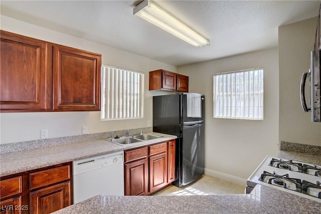 2801 N Rainbow Blvd Unit 273, Las Vegas, NV 89108 - kitchen with white appliances and light countertops