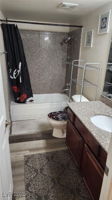 5000 Indian River Dr Unit 483, Las Vegas, NV 89103 - full bath with vanity, shower / tub combo, and wood finished floors