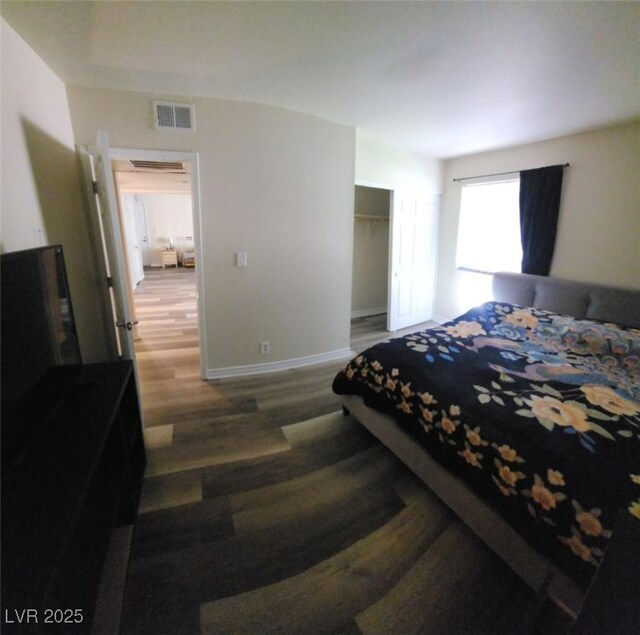 5000 Indian River Dr Unit 483, Las Vegas, NV 89103 - bedroom featuring wood finished floors and a closet