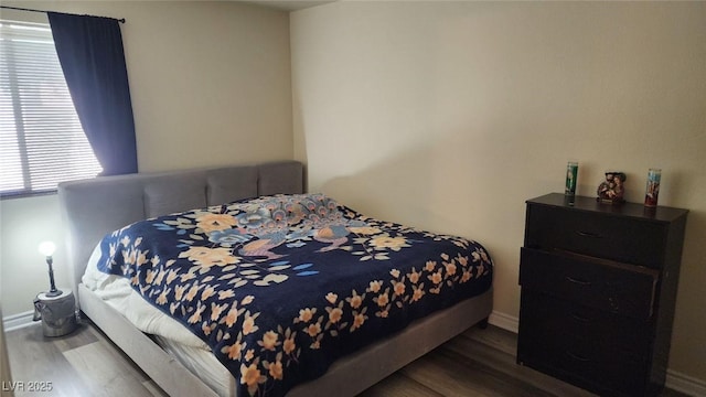 5000 Indian River Dr Unit 483, Las Vegas, NV 89103 - bedroom featuring wood finished floors and baseboards