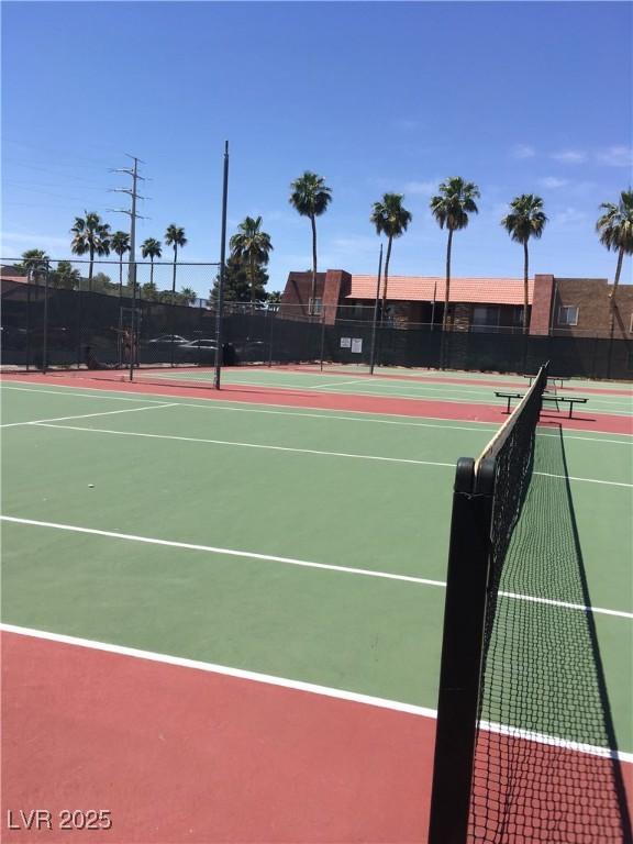 5000 Indian River Dr Unit 483, Las Vegas, NV 89103 - view of tennis court featuring community basketball court