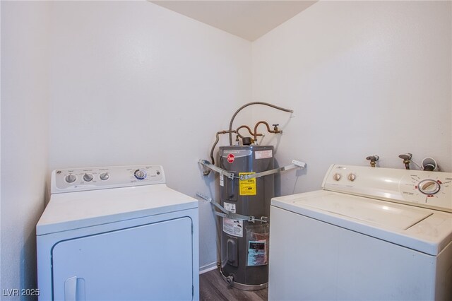 2696 Jennydiane Dr, Las Vegas, NV 89121 - laundry room with strapped water heater, washing machine and clothes dryer, and dark wood-style flooring