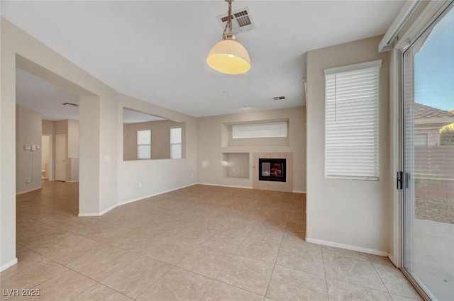 189 Paxon Hollow Ct, Las Vegas, NV 89148 - unfurnished living room featuring light tile patterned floors and a tiled fireplace