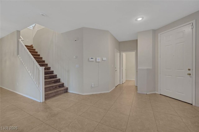 189 Paxon Hollow Ct, Las Vegas, NV 89148 - unfurnished room with light tile patterned floors, stairway, and recessed lighting