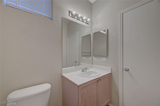 189 Paxon Hollow Ct, Las Vegas, NV 89148 - half bathroom with toilet and vanity