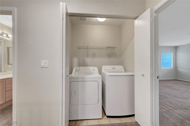 189 Paxon Hollow Ct, Las Vegas, NV 89148 - laundry area with light carpet and washer and dryer