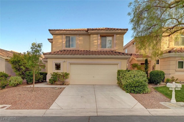 189 Paxon Hollow Ct, Las Vegas, NV 89148 - mediterranean / spanish house with driveway, a garage, stucco siding, and a tiled roof