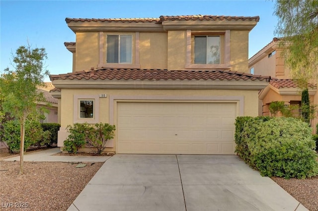 189 Paxon Hollow Ct, Las Vegas, NV 89148 - mediterranean / spanish home with a garage, driveway, a tiled roof, and stucco siding