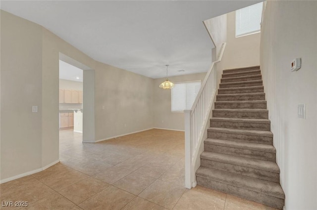 189 Paxon Hollow Ct, Las Vegas, NV 89148 - staircase featuring a chandelier and tile patterned flooring